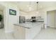 Kitchen boasts granite countertops and modern appliances at 109 Bonita Dr, Rotonda West, FL 33947