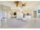 Open living area with a view of the kitchen and entryway at 109 Bonita Dr, Rotonda West, FL 33947