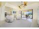 Spacious living area with a large TV and comfortable seating at 109 Bonita Dr, Rotonda West, FL 33947