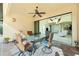 Outdoor patio with seating area and view of living room at 109 Bonita Dr, Rotonda West, FL 33947