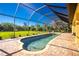 Screened pool and patio area with backyard view at 109 Bonita Dr, Rotonda West, FL 33947