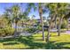 Tropical backyard with hammocks and water access at 13104 Via Cassia, Placida, FL 33946