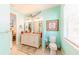 Double vanity bathroom with light cabinetry and granite countertops at 13104 Via Cassia, Placida, FL 33946