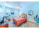 Bedroom with coral bedding and coastal decor at 13104 Via Cassia, Placida, FL 33946