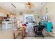 Spacious living area with an open concept kitchen and coastal decor at 13104 Via Cassia, Placida, FL 33946