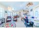 Open living room featuring comfortable seating and an open floor plan at 13104 Via Cassia, Placida, FL 33946