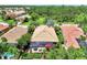 Aerial view of home with pool and covered lanai at 13123 Preserve Ct, Port Charlotte, FL 33953