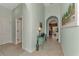 Spacious entryway with tile floors and views to living areas at 13123 Preserve Ct, Port Charlotte, FL 33953