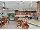 Modern kitchen featuring granite counters and stainless steel appliances at 13123 Preserve Ct, Port Charlotte, FL 33953