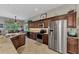 Modern kitchen with granite counters and stainless steel appliances at 13123 Preserve Ct, Port Charlotte, FL 33953