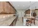 Kitchen boasts granite counters, stainless steel appliances, and an island at 13123 Preserve Ct, Port Charlotte, FL 33953