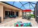 Large lanai with multiple seating areas and views at 13123 Preserve Ct, Port Charlotte, FL 33953