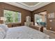 Main bedroom with sliding glass doors that lead to a private patio at 13123 Preserve Ct, Port Charlotte, FL 33953