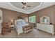Spacious main bedroom with a cozy sitting area and access to the back patio at 13123 Preserve Ct, Port Charlotte, FL 33953