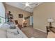 Relaxing office space with a sofa and built-in shelving at 13123 Preserve Ct, Port Charlotte, FL 33953