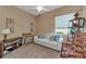 Cozy office featuring a comfortable sofa and rocking chair at 13123 Preserve Ct, Port Charlotte, FL 33953