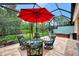 Relaxing screened patio with hot tub, seating area, and lush landscaping at 13123 Preserve Ct, Port Charlotte, FL 33953