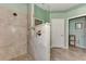 Walk-in shower with neutral tile and a built-in niche at 13123 Preserve Ct, Port Charlotte, FL 33953