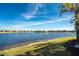 Stunning lakefront view from backyard, serene setting at 1414 Backspin Dr, Englewood, FL 34223