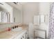Bathroom with updated vanity, tile flooring, and shower/tub at 1531 Placida Rd # 1-204, Englewood, FL 34223