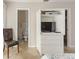 Small bathroom with toilet and shower, visible from bedroom at 1531 Placida Rd # 1-204, Englewood, FL 34223