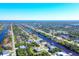 Aerial view of waterfront homes and canals, showcasing community layout at 15336 Lakeland Cir, Port Charlotte, FL 33981