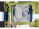 Bird's-eye view of house, pool, dock, and canal at 15336 Lakeland Cir, Port Charlotte, FL 33981