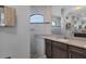 Primary bathroom with granite countertops and walk-in shower at 15336 Lakeland Cir, Port Charlotte, FL 33981