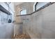 Spa-like bathroom with walk-in shower and built-in bench at 15336 Lakeland Cir, Port Charlotte, FL 33981