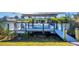 Private boat dock with covered seating area and room for a boat at 15336 Lakeland Cir, Port Charlotte, FL 33981