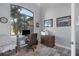 Home office with built-in desk and large window at 15336 Lakeland Cir, Port Charlotte, FL 33981
