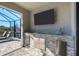 Outdoor kitchen with stonework and stainless steel appliances at 15336 Lakeland Cir, Port Charlotte, FL 33981