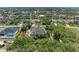 Lovely neighborhood aerial view with waterfront homes, beautiful canals, lush landscaping, and private pools at 15375 Taurus Cir, Port Charlotte, FL 33981