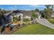 Single story home with landscaped yard and two car garage at 15375 Taurus Cir, Port Charlotte, FL 33981