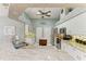 Bright kitchen with granite counters, island, and stainless steel appliances at 15375 Taurus Cir, Port Charlotte, FL 33981