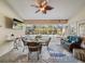 Relaxing poolside patio with seating and view of pool at 15375 Taurus Cir, Port Charlotte, FL 33981