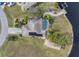 Bird's eye view of home, solar panels, and dock at 15500 Longview Rd, Port Charlotte, FL 33981