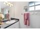 Bathroom with vanity, sink, and mirrored medicine cabinet at 15500 Longview Rd, Port Charlotte, FL 33981