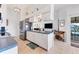 Updated kitchen with stainless steel appliances and a breakfast bar at 15500 Longview Rd, Port Charlotte, FL 33981