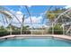 View of refreshing pool with canal view beyond at 15500 Longview Rd, Port Charlotte, FL 33981