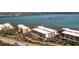 Sandpiper Rey complex aerial view highlighting its beachfront location at 1651 Beach Rd # 212, Englewood, FL 34223