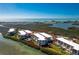 Sandpiper Rey complex, aerial view highlighting its waterfront position at 1651 Beach Rd # 212, Englewood, FL 34223