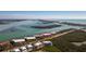 Aerial perspective of Sandpiper Rey, highlighting its waterfront setting at 1651 Beach Rd # 212, Englewood, FL 34223