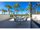 Balcony with table and chairs, offering scenic views at 1651 Beach Rd # 212, Englewood, FL 34223