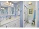 Clean bathroom, shower, vanity, and toilet at 1651 Beach Rd # 212, Englewood, FL 34223