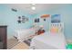 Two twin beds in a well-lit bedroom at 1651 Beach Rd # 212, Englewood, FL 34223
