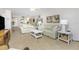 Spacious living room with tiled floors and ample natural light at 1651 Beach Rd # 212, Englewood, FL 34223