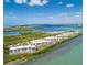 Aerial view of condo building on waterfront property at 1751 Beach Rd # 204, Englewood, FL 34223
