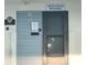 Association manager office entrance with key and mail slot at 1751 Beach Rd # 204, Englewood, FL 34223