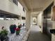 Ground level condo hallway with elevator access at 1751 Beach Rd # 204, Englewood, FL 34223